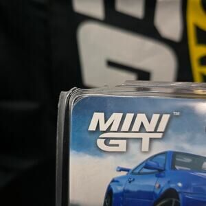 Mini GT 1/64 Skyline GT-R R34 V-Spec Bayside Blue #759 PKG CRACK